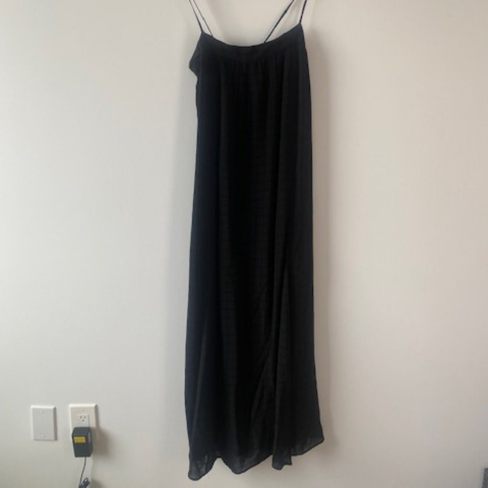 Black thin strap maxi dress w/ slit.